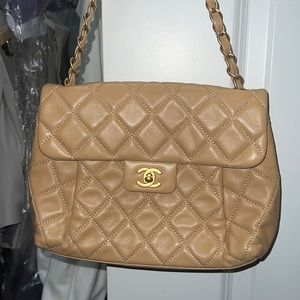 Used once Chanel handbag in tan.  Excellent condition. Low ball offers ignored